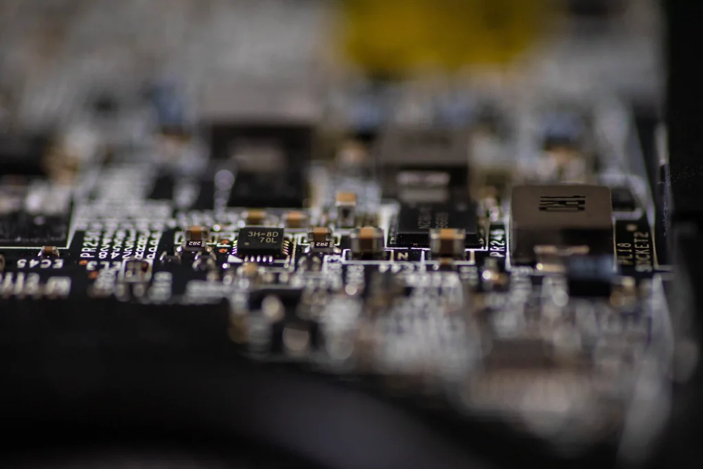 Micro-soldering detail on a laptop motherboard